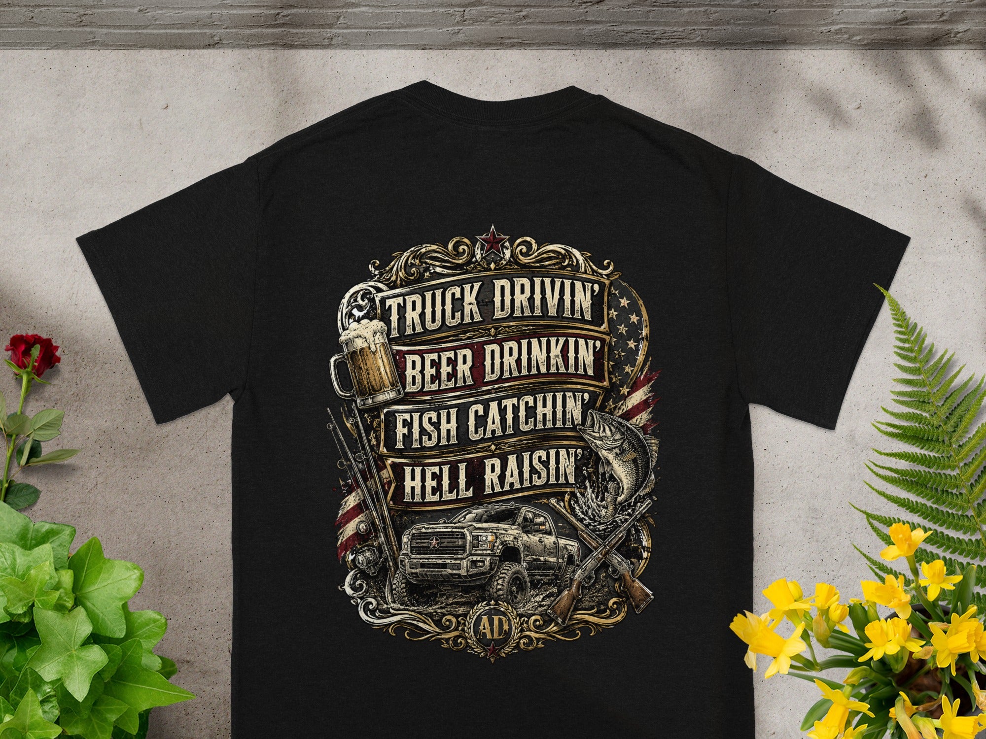 Black t-shirt with "Truck Drivin' Beer Drinkin' Fish Catchin' Hell Raisin'" text and graphics.