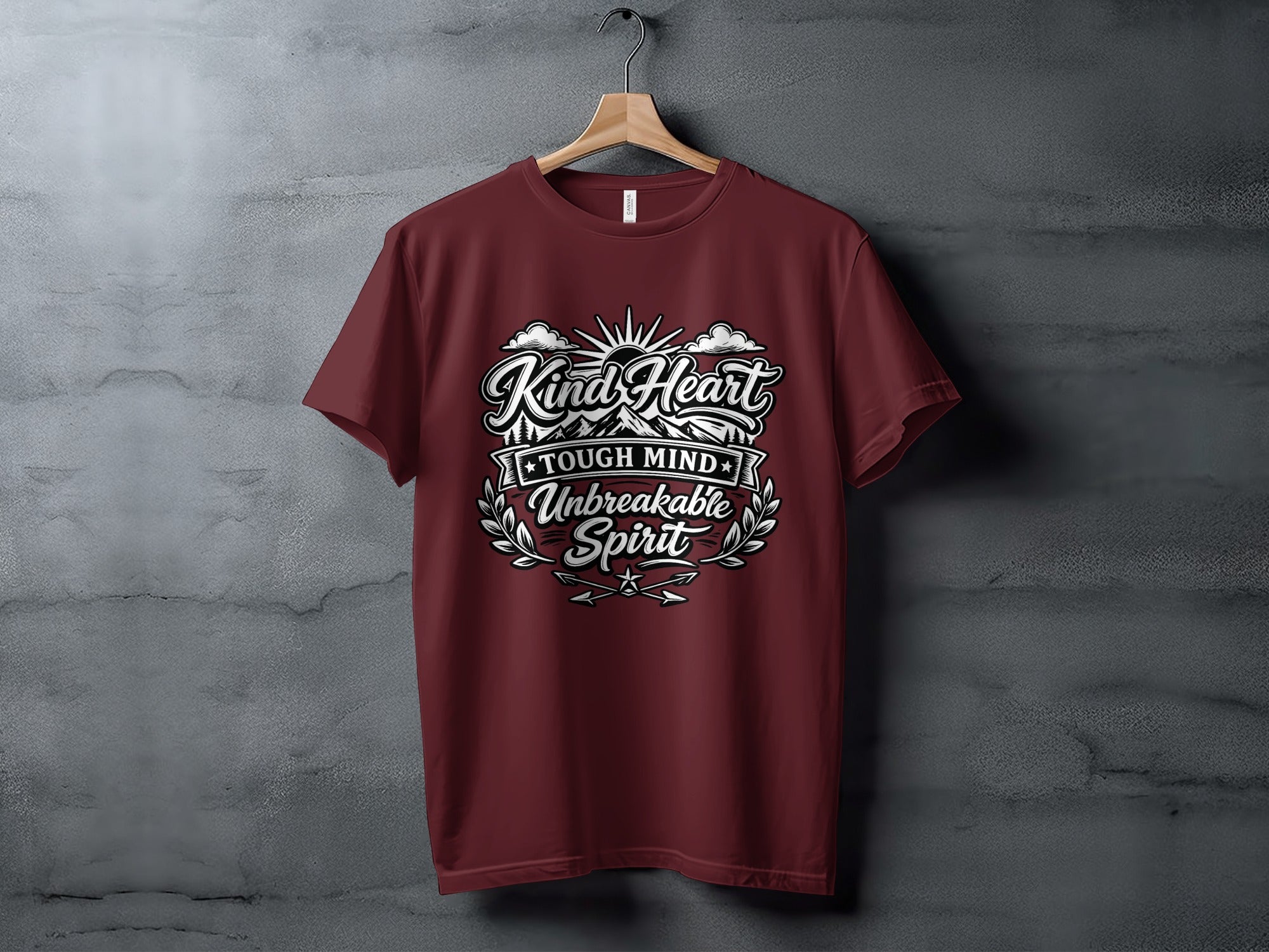 Maroon t-shirt with "Kind Heart, Tough Mind, Unbreakable Spirit" text design.