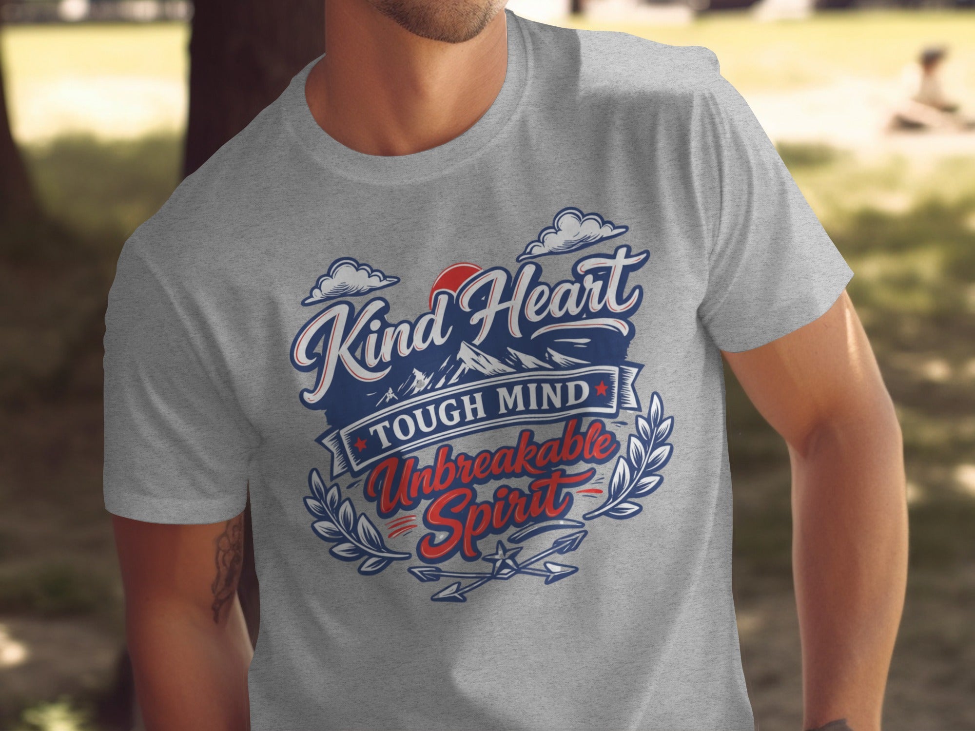 Grey t-shirt with "Kind Heart Tough Mind Unbreakable Spirit" text.