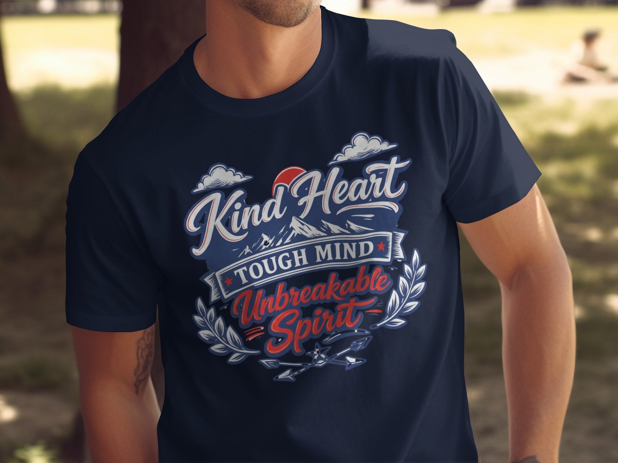 Navy t-shirt with "Kind Heart Tough Mind Unbreakable Spirit" text design.