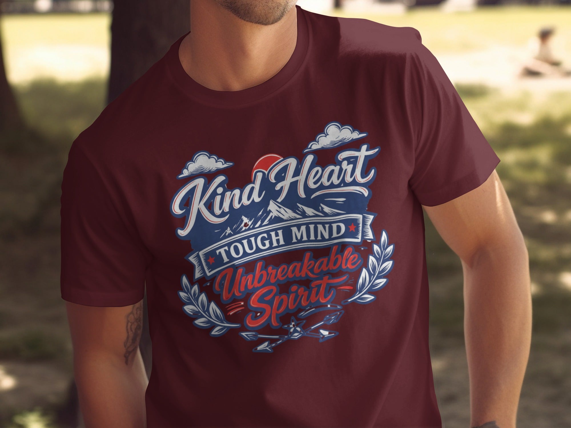 T-shirt with "Kind Heart Tough Mind Unbreakable Spirit" text design.
