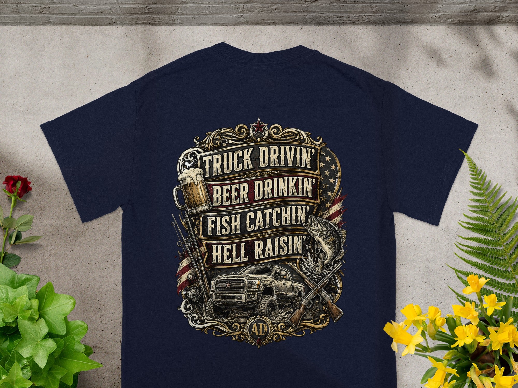 Navy t-shirt with "Truck Drivin' Beer Drinkin' Fish Catchin' Hell Raisin'" text and graphics.
