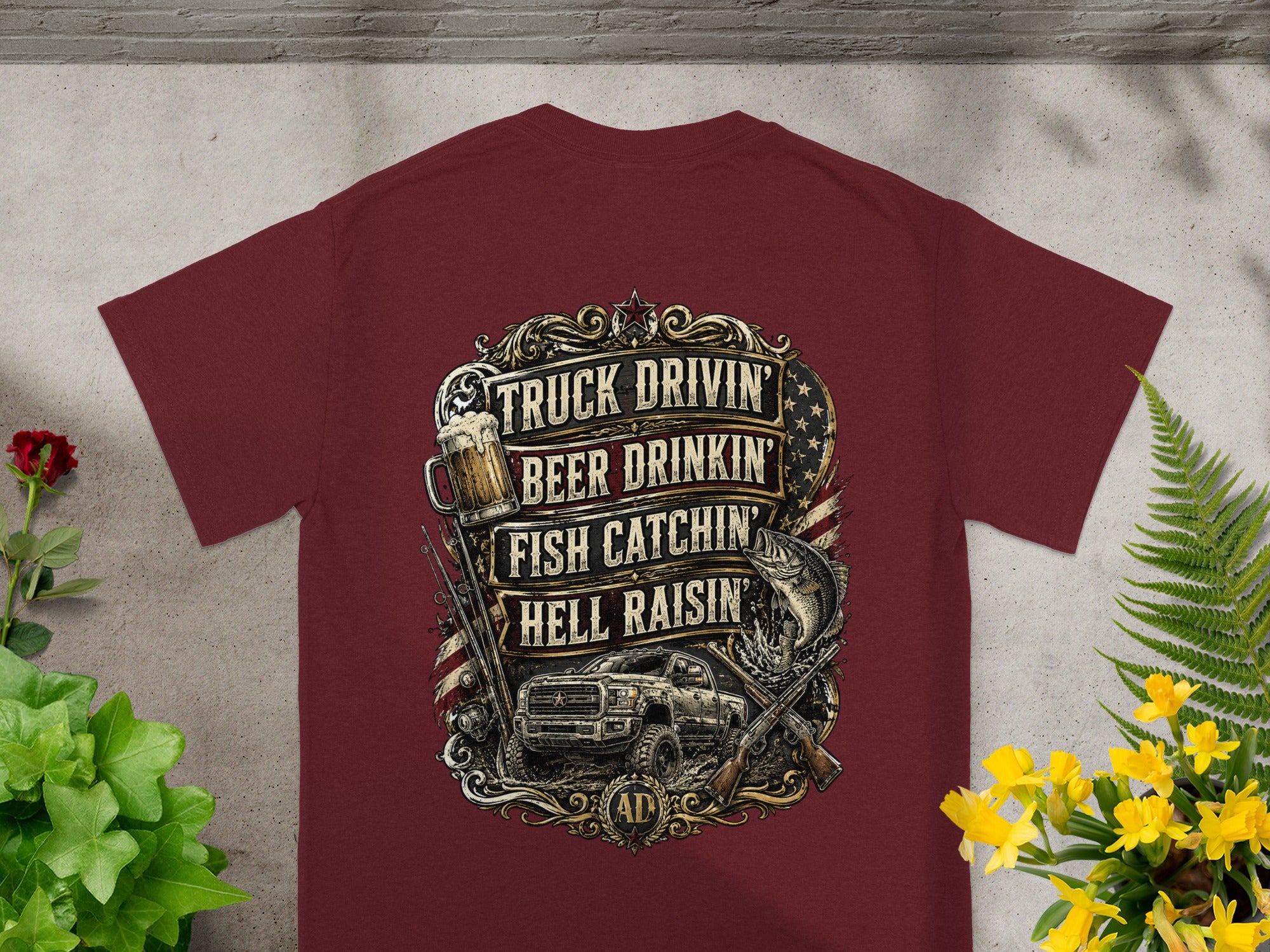 Maroon t-shirt with "Truck Drivin' Beer Drinkin' Fish Catchin' Hell Raisin'" text and graphic.