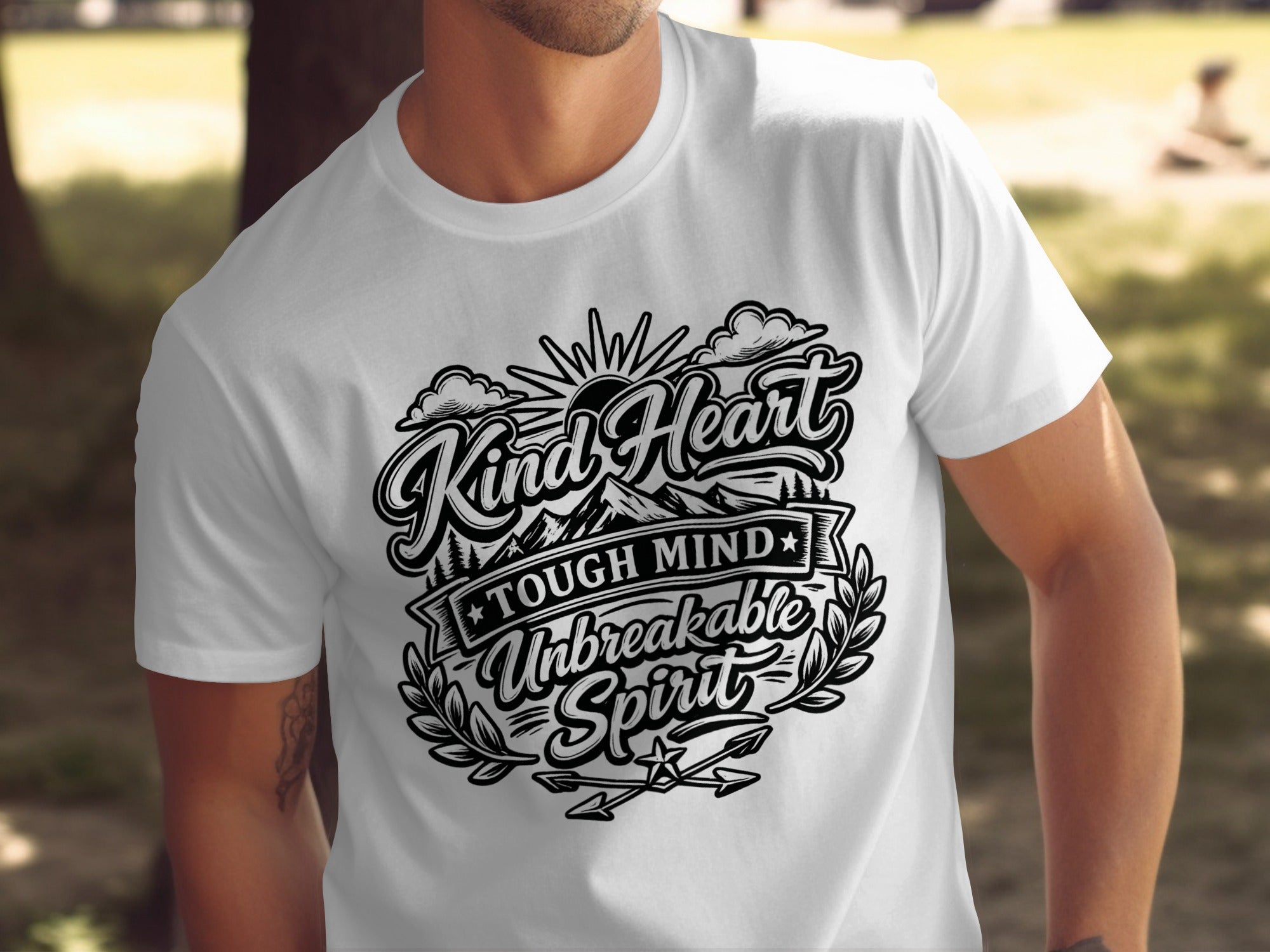 White t-shirt with "Kind Heart Tough Mind Unbreakable Spirit" text design.