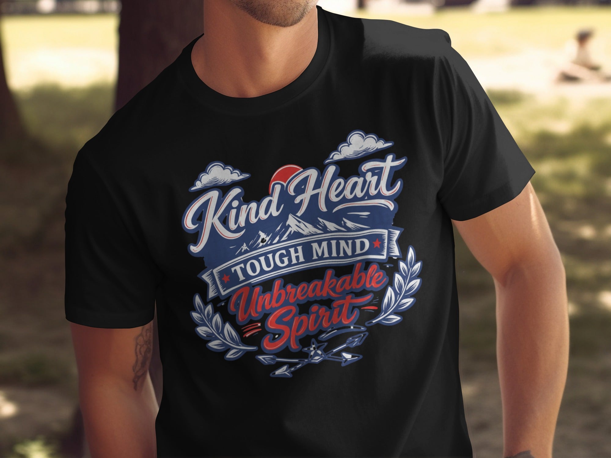 Black t-shirt with "Kind Heart, Tough Mind, Unbreakable Spirit" text design.