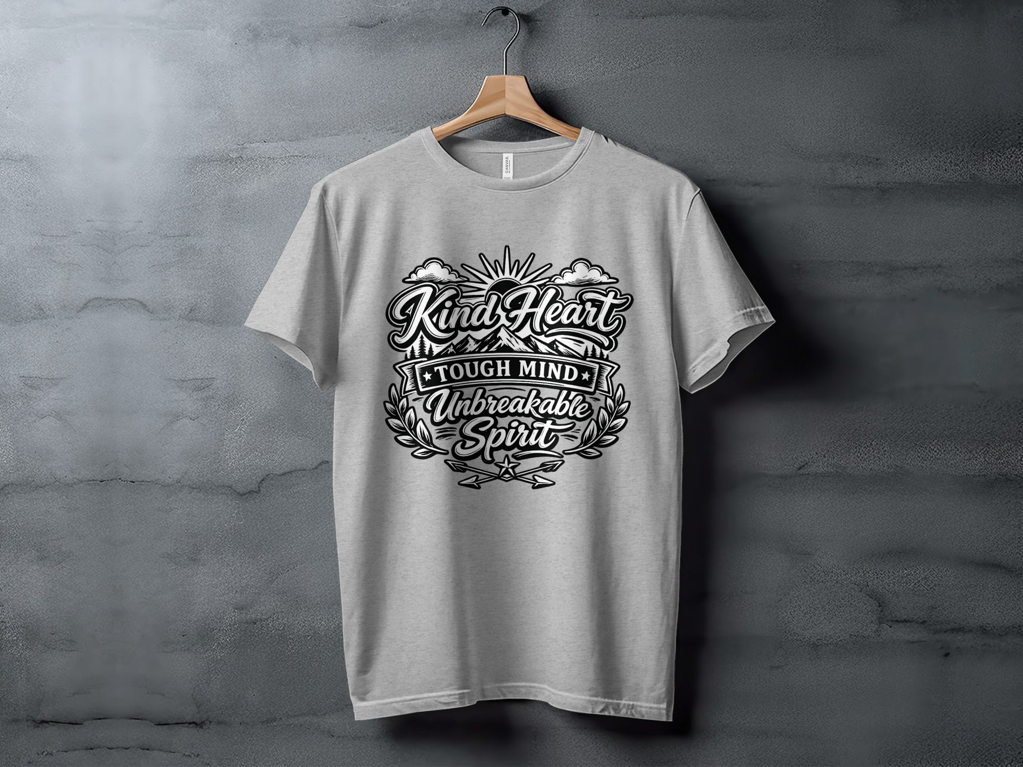 Grey t-shirt with "Kind Heart Tough Mind Unbreakable Spirit" text graphic.