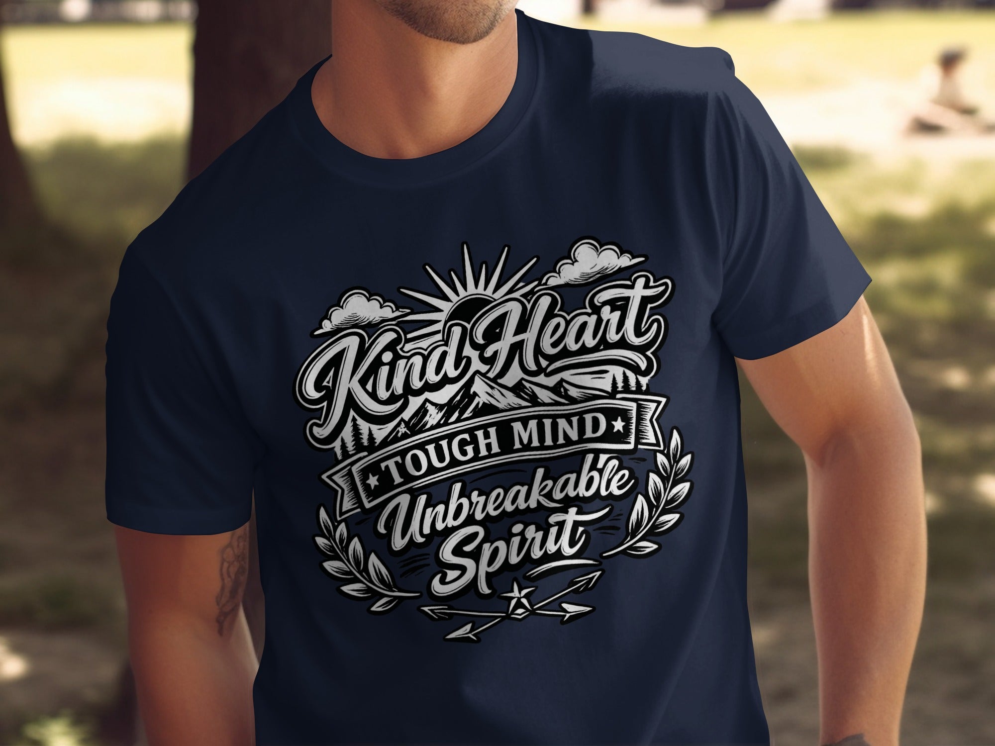 Dark t-shirt with "Kind Heart Tough Mind Unbreakable Spirit" text design.