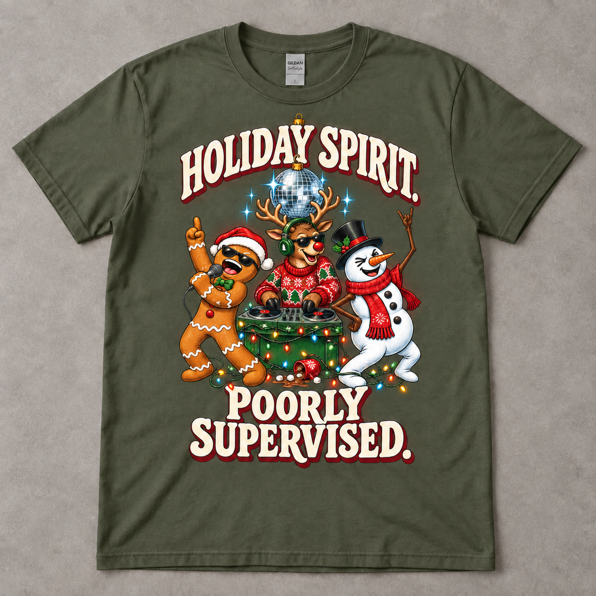 Military Green Gildan Softstyle G640 tee on a neutral gray table with Aurendae's Holiday Spirit. Poorly Supervised. Christmas party graphic.